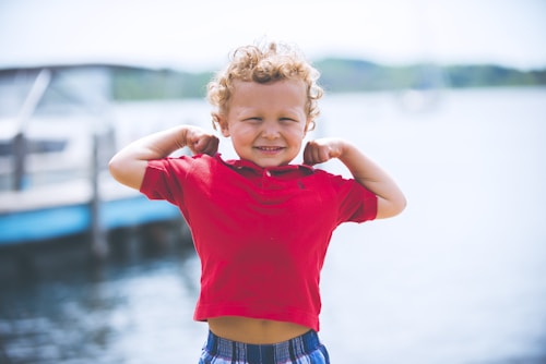 A child celebrating a healthy check-up